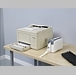 Imagen de una impresora Zebra HC100 en comparación con láser